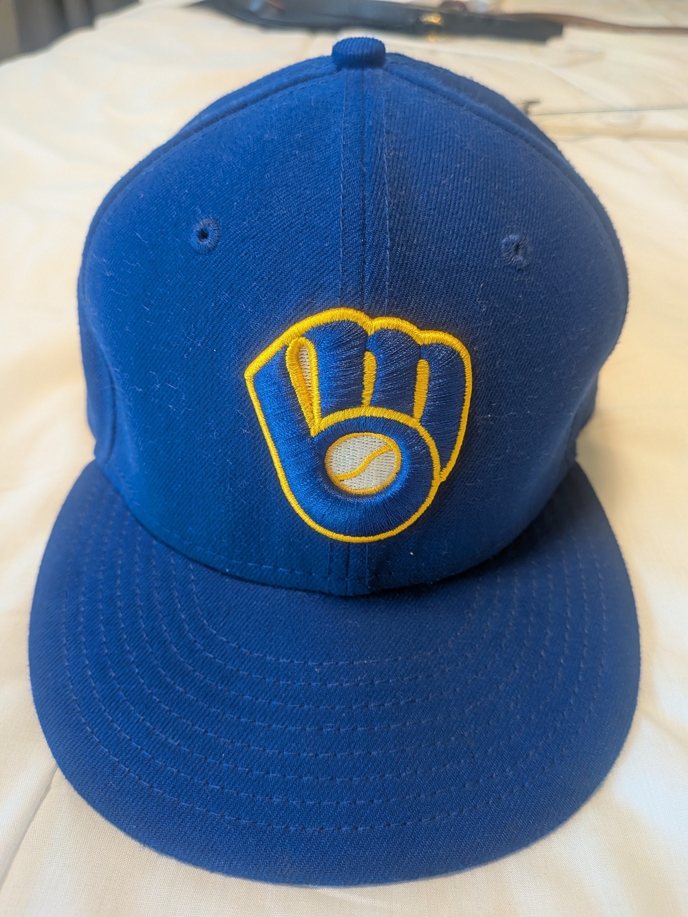 New Era Royal Blue Cap with Yellow Glove Logo